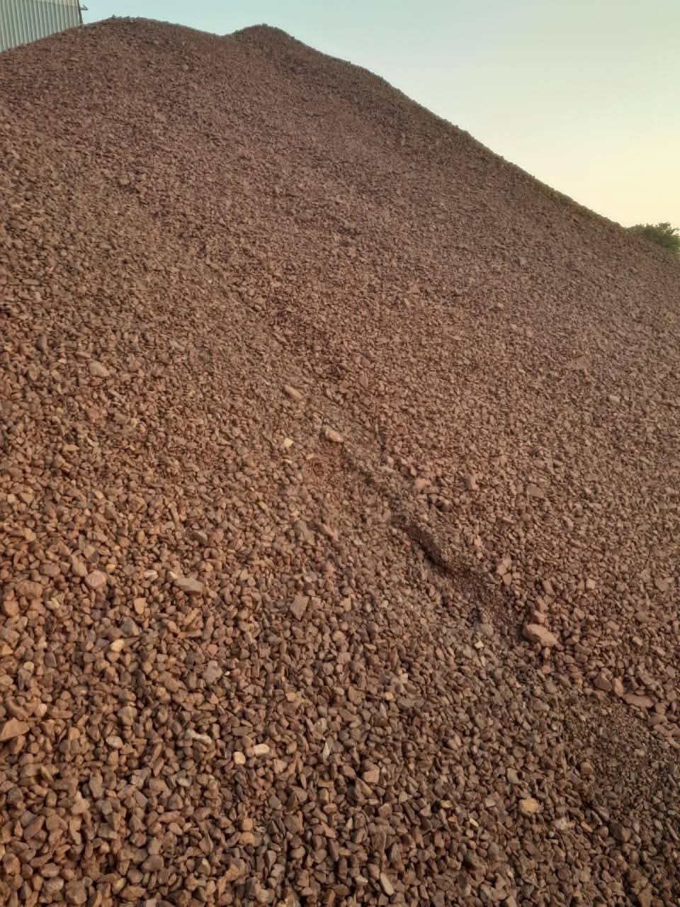 Large stockpile of crushed ore ready for dispatch
