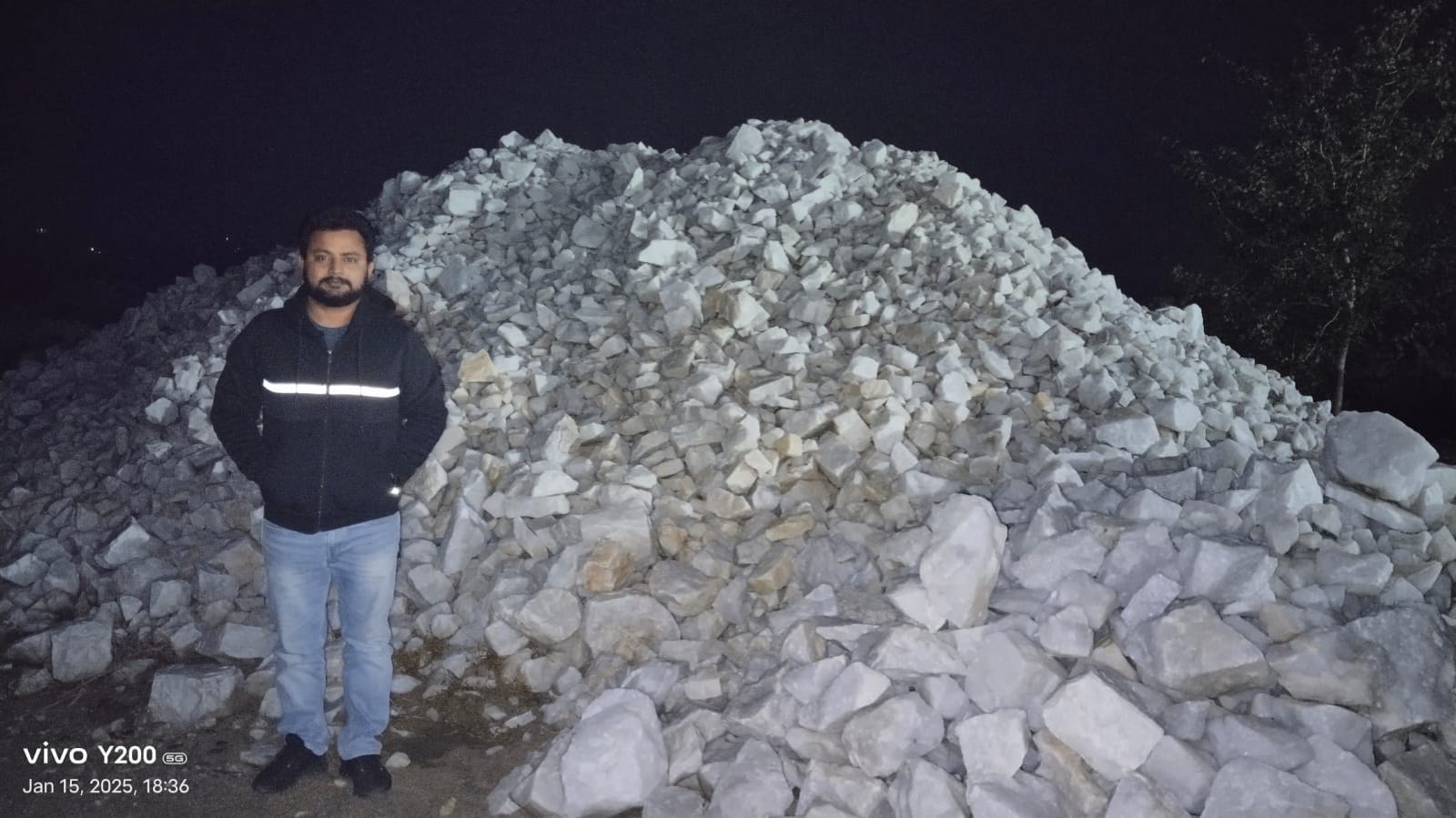 Alham Exim director inspecting quartz stock at Rajasthan mine