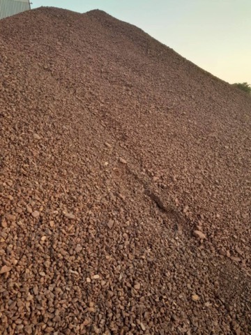 Bentonite and ore fines heap at yard
